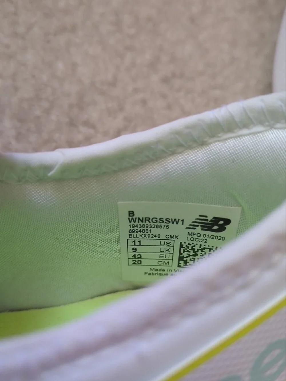 New Balance Women's White Athletic Sneakers with Blue & Yellow